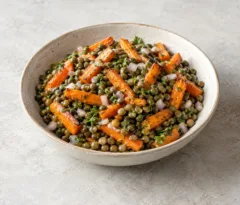 Salade tiède de lentilles vertes et bâtonnets de carottes rôties au persil